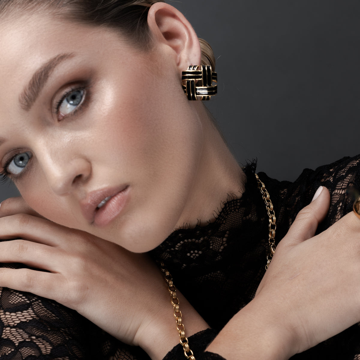 Oversized Woven Earrings in 14k gold-plated stainless steel with black enamel
