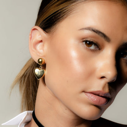 Silk & Steel Cupid drop earrings in 14k gold-plated stainless steel.