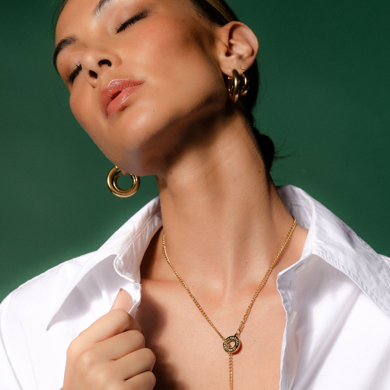Silk & Steel Orbit Lariat necklace in 14k gold-plated stainless steel.