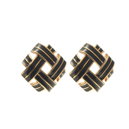 Vintage-inspired statement earrings in 14k gold-plated stainless steel with hand-painted black enamel criss-cross detailing